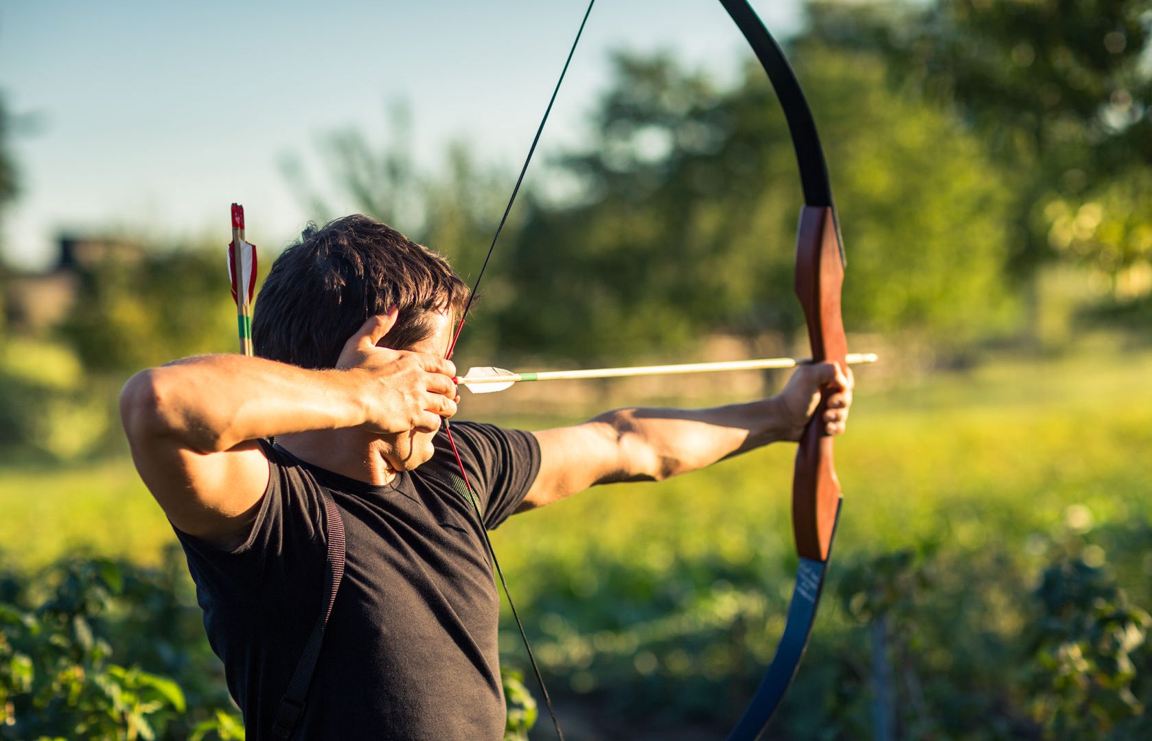 35946254 - young archer training with the  bow